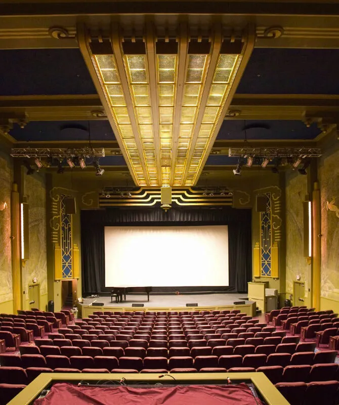 Theater seating with a center view of the stage.